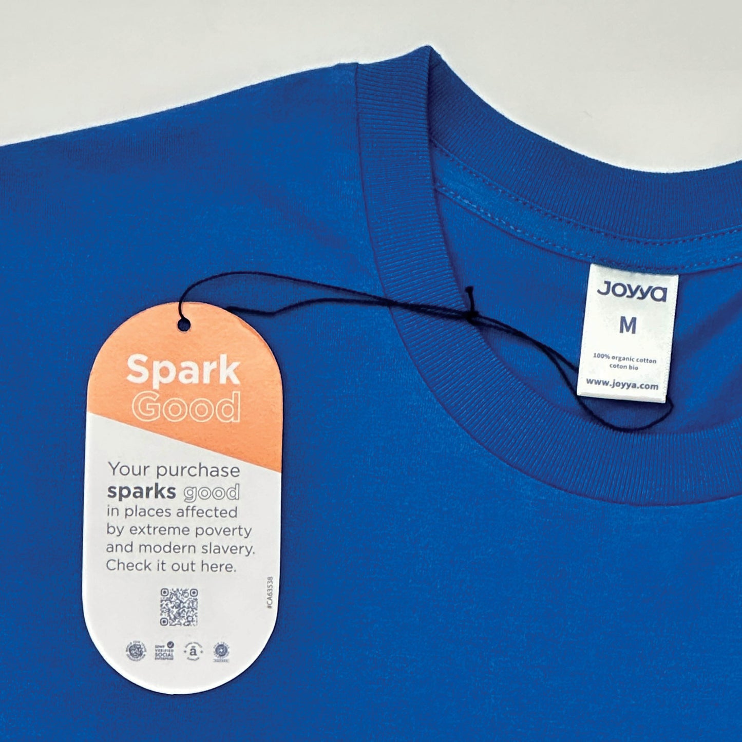 Tag of Rare Blue Seaweed T-shirt, highlighting fair-trade and organic cotton seals