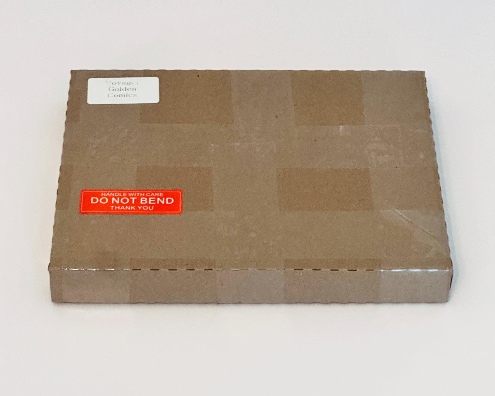 The Theft of the Rare Blue Seaweed print comics in packaging for shipping